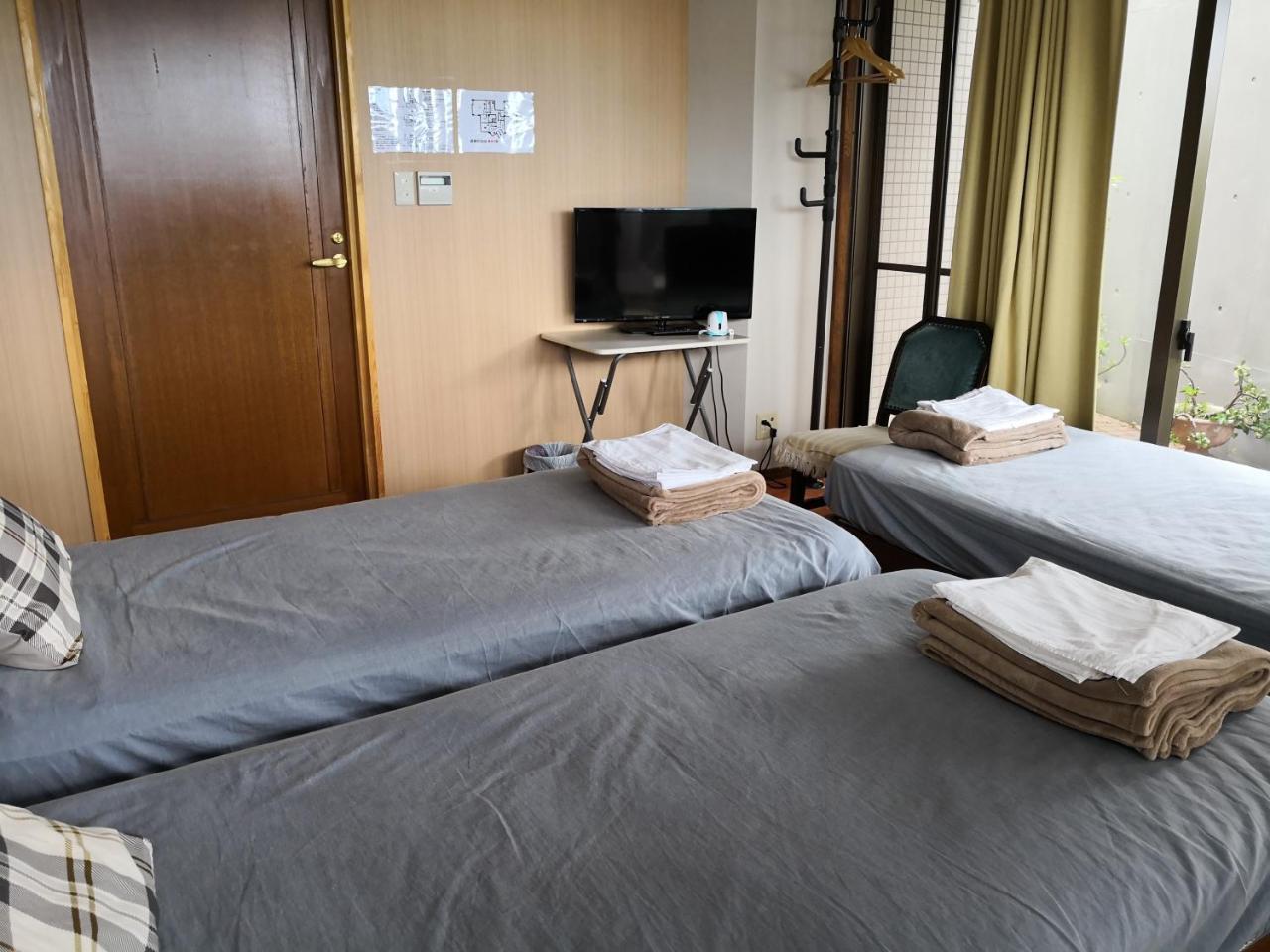 Atami Onsen Guest House Megumi Esterno foto